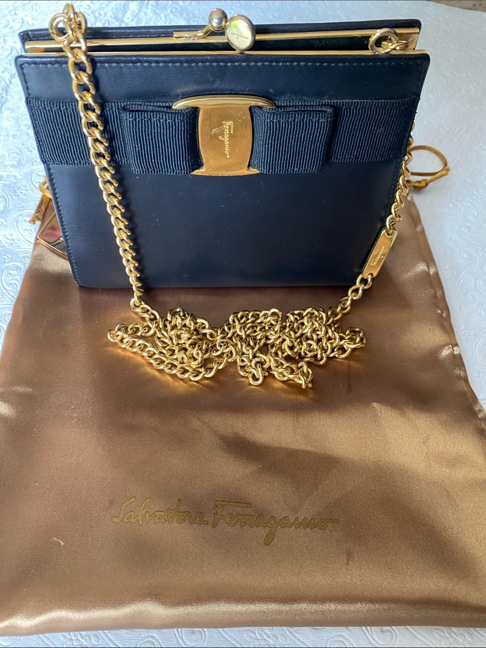 Salvatore Ferragamo Black Leather Mini Bag with Gold Chain and Bow Plaque